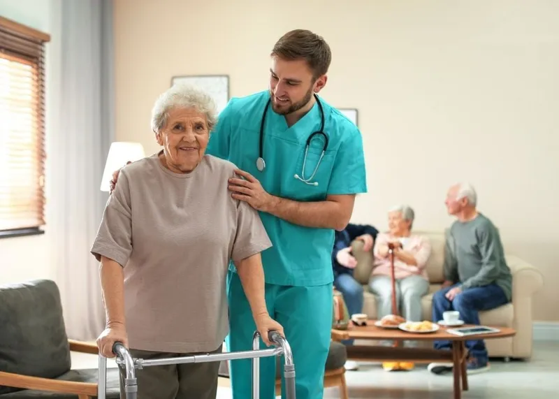 A home care nurse checking on an elderly patient at home in Istanbul