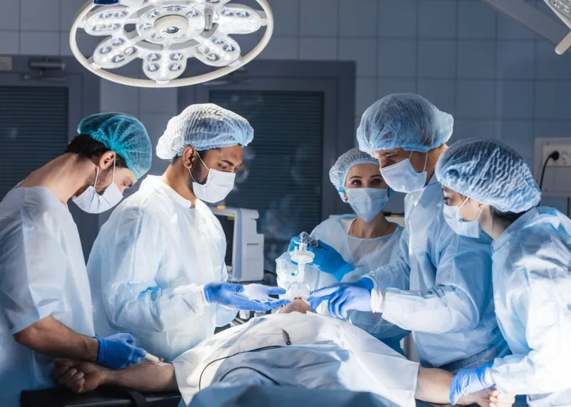 A physician reviews a patient's medical records during a consultation at an Istanbul hospital.