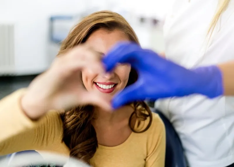 Dentist examining a patient during a check-up at a modern Istanbul dental clinic