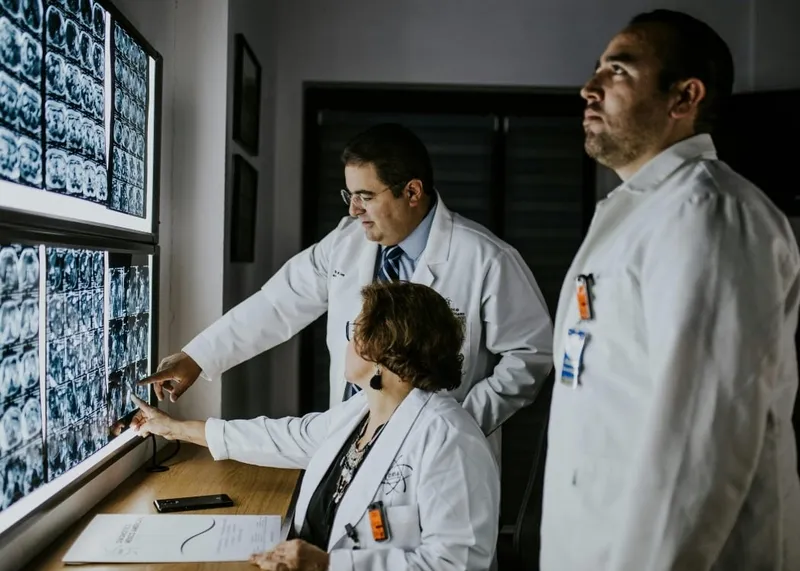 Two physicians in Istanbul reviewing a patient's scans together during a second-opinion consultation